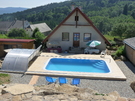 Chalupa k pronajmutí s bazénem v obci Hojná Voda nabízí pěkné a levné ubytování v Novohradských horách. Svou levnou dovolenou v chalupě s bazénem můžete prožít právě v chalupě "Penzion pod Kraví horou" -  Hojná Voda - Novohradské hory. Kromě bazénu u nás